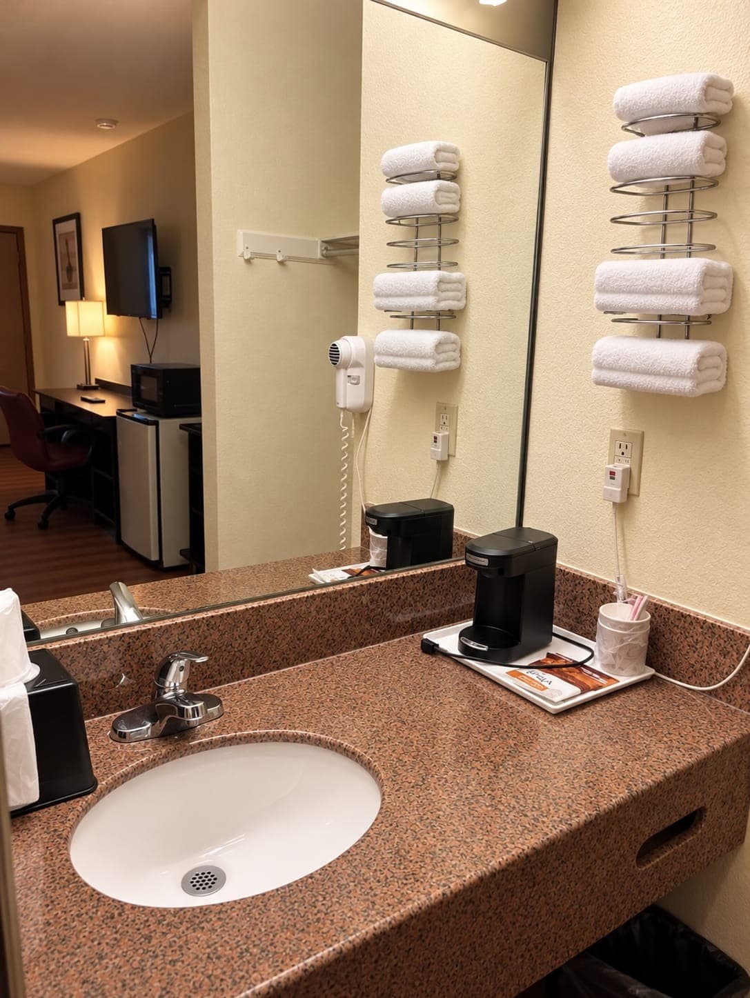 Mountain Inn vanity with coffee maker, hair dryer and fresh towels